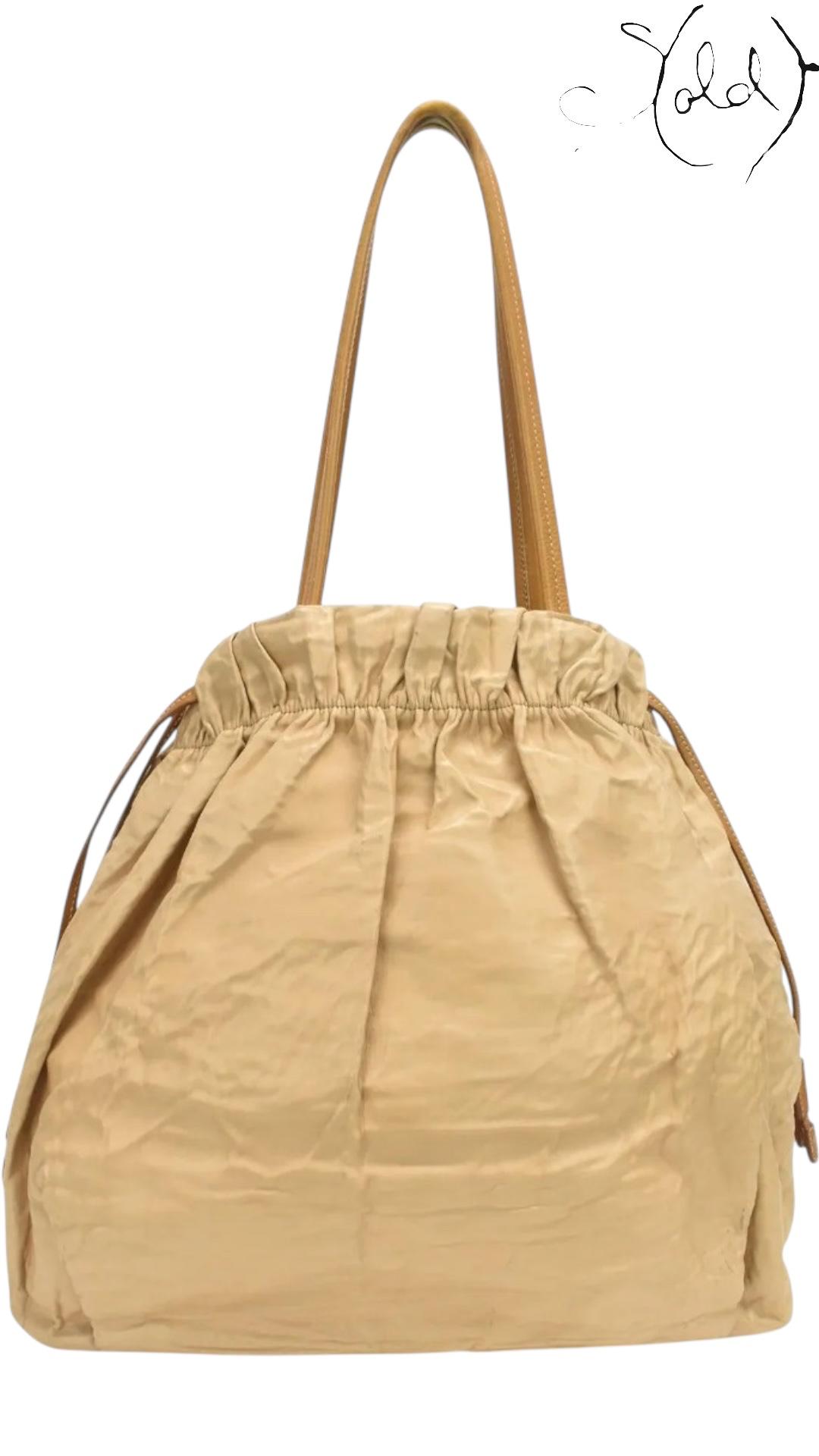 Sold Attire Bag PRADA Metallic Gold Drawstring Tote – Tessuto Nylon & Leather | Sold Attire