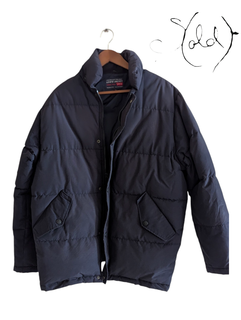 Levi’s Quilted Puffer– Vintage Warmth & Style