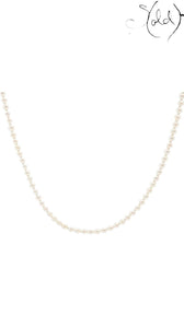 Sold Attire long cream-white Akoya pearl necklace with a lustrous finish and silver clasp