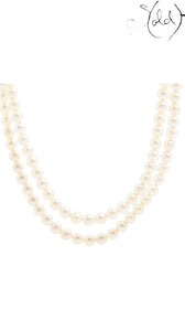 Sold Attire Akoya white two-row pearl necklace with a floral clasp. Pearls are white to warm cream.
