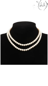 Sold Attire Akoya white two-row pearl necklace with SV floral clasp, 41.6 cm length.
