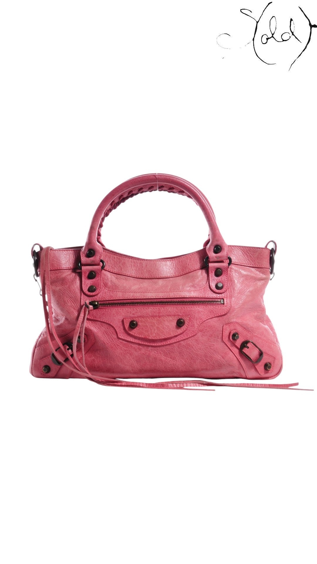 Sold Attire hot pink distressed lambskin Balenciaga The First 2-Way handbag with tassel zip pulls and classic motorcycle studs.