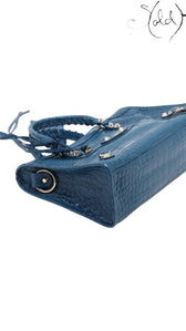 Sold Attire Balenciaga City bag in Bleu Marine crocodile-embossed calfskin with classic silver-tone hardware.