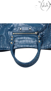 Sold Attire Balenciaga Bleu Marine crocodile-embossed calfskin City bag with signature studs and rolled leather handle.