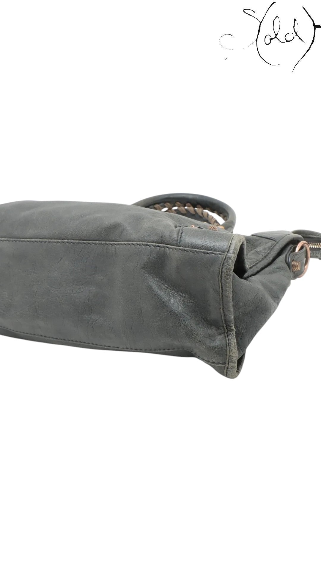 Sold Attire Balenciaga Giant City 2-Way Bag in green distressed leather with aged metal hardware and braided handles.