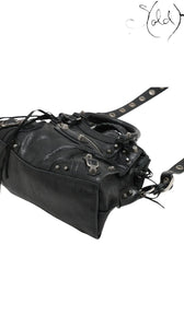 Sold Attire Balenciaga Neo Cagole XS bag in black lambskin leather with silver-tone stud hardware and braided handles.