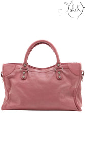 Sold Attire heather pink agneau lambskin Balenciaga City Giant 12 bag with silver hardware and top handles.