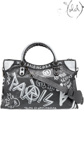 Sold Attire black agneau lambskin Balenciaga Graffiti City bag with white hand-painted graffiti and classic hardware.