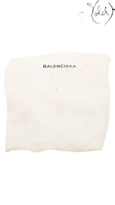 Sold Attire Balenciaga Graffiti City Classic Hardware black lambskin bag with white hand-painted graffiti.