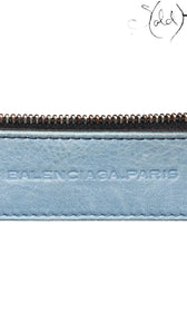 Sold Attire: Balenciaga Part Time Giant 12 bag in Bleu Glacier lambskin with rose gold hardware. Embossed logo.