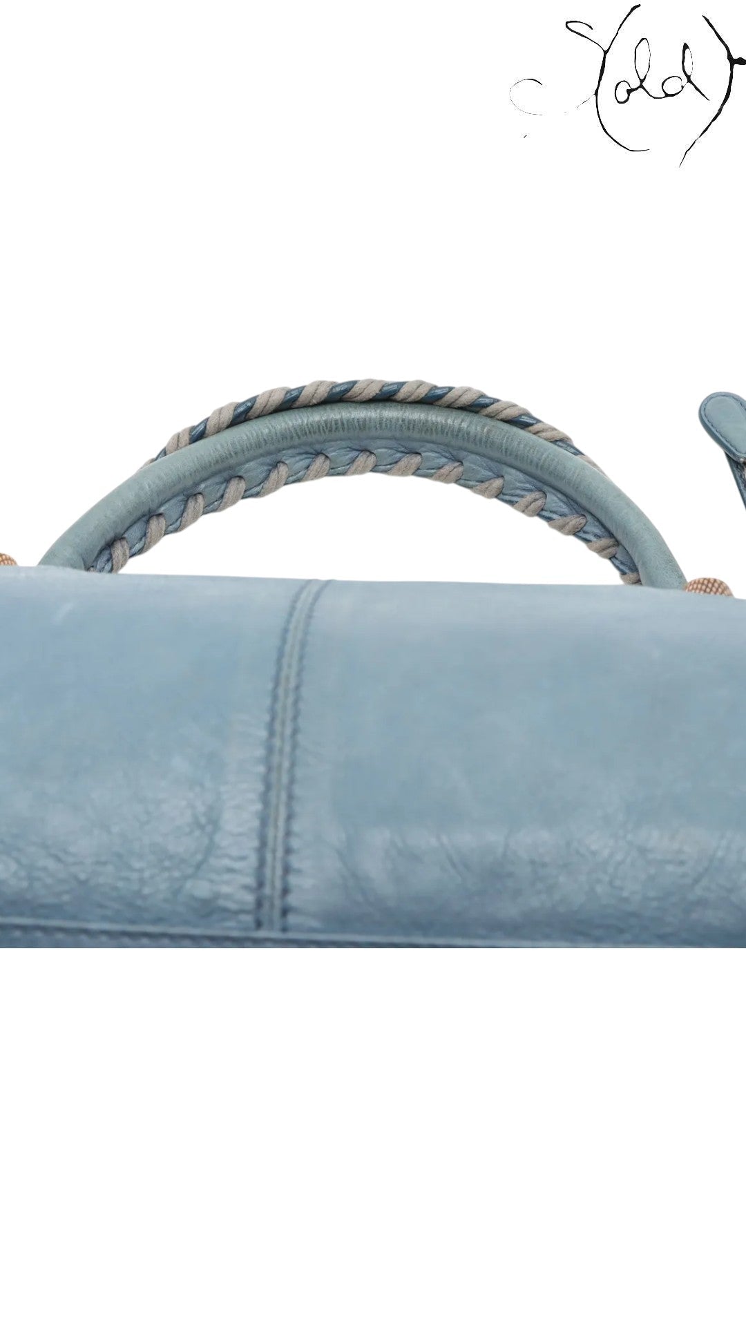 Sold Attire Balenciaga Part Time handbag in Bleu Glacier lambskin with rose gold hardware and braided handle detail.