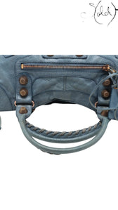Sold Attire blue glacier lambskin Balenciaga Part Time Giant 12 bag with rose gold hardware and braided handle detail.