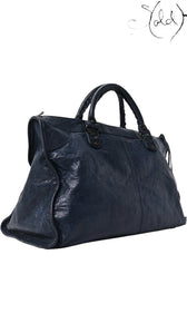 Sold Attire navy blue lambskin Balenciaga Classic Hardware Work bag with aged brass hardware and rolled handles.