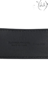 Sold Attire Bottega Veneta black leather belt interior showing the embossed logo and Made in Italy stamp