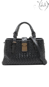 Sold Attire black Bottega Veneta Roma Intrecciato nappa leather 2-way handbag with brushed silver hardware and lock detail.