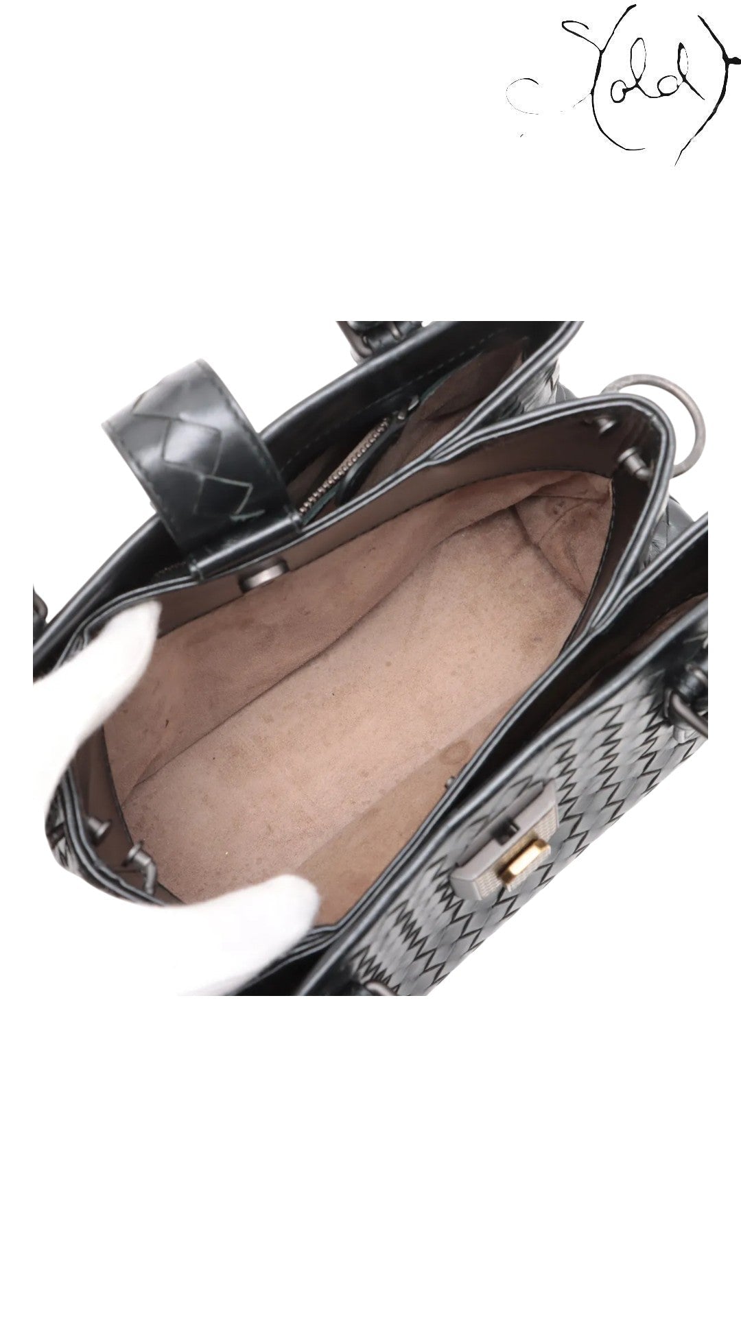 Sold Attire Bottega Veneta Roma black Intrecciato woven nappa leather 2-way handbag with silver-tone hardware and lock detail.