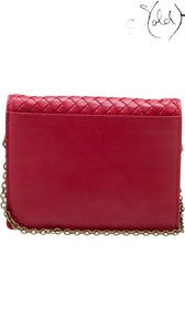 Sold Attire red Bottega Veneta Intrecciato leather wallet on chain with antiqued gold-tone shoulder strap.
