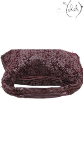 Sold Attire Bottega Veneta burgundy Velours Veneta hobo bag featuring signature Intrecciato woven suede and leather.