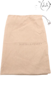 Sold Attire beige fabric dust bag with Bottega Veneta logo printed in the center and a drawstring closure