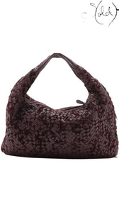 Sold Attire Bottega Veneta burgundy Intrecciato woven suede and leather hobo bag with fringe-textured edges.