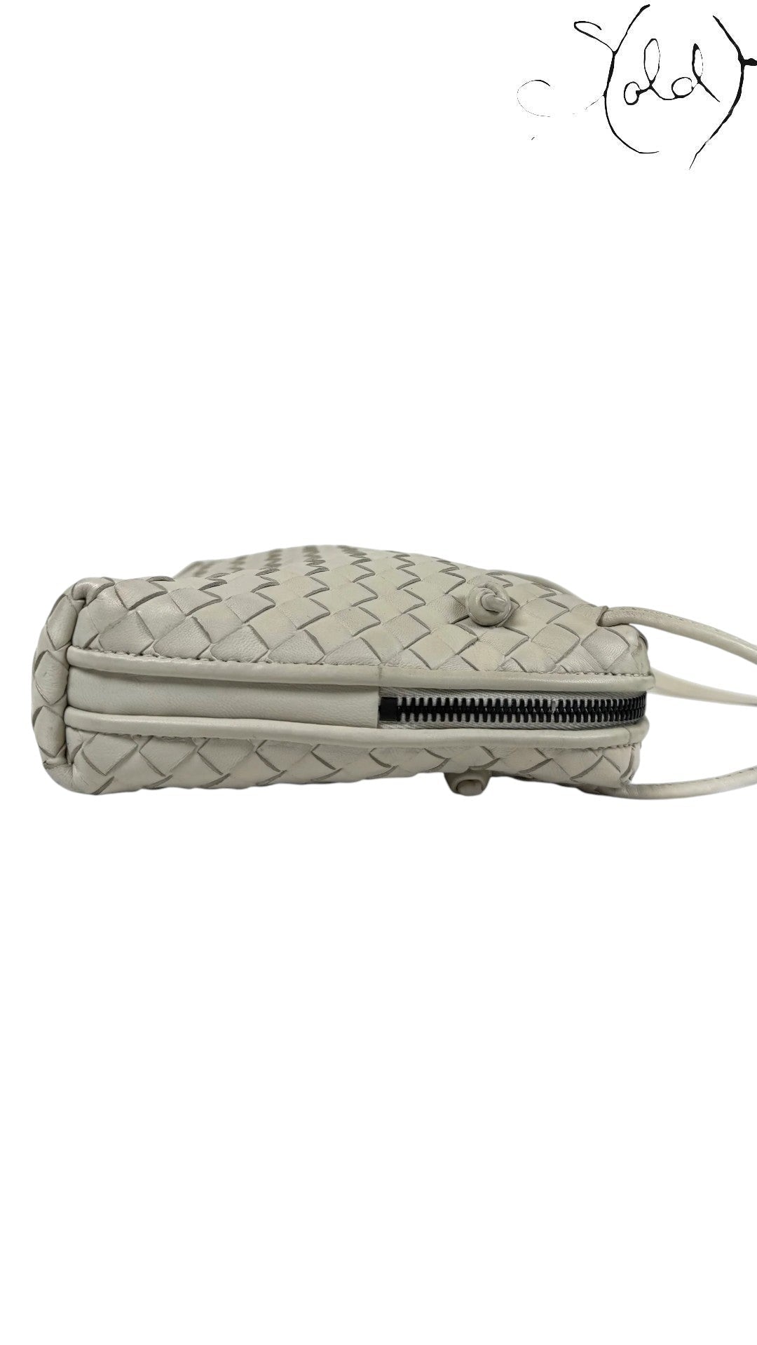 Sold Attire taupe nappa leather Bottega Veneta Nodini crossbody bag with signature Intrecciato weave and dark gunmetal zipper.
