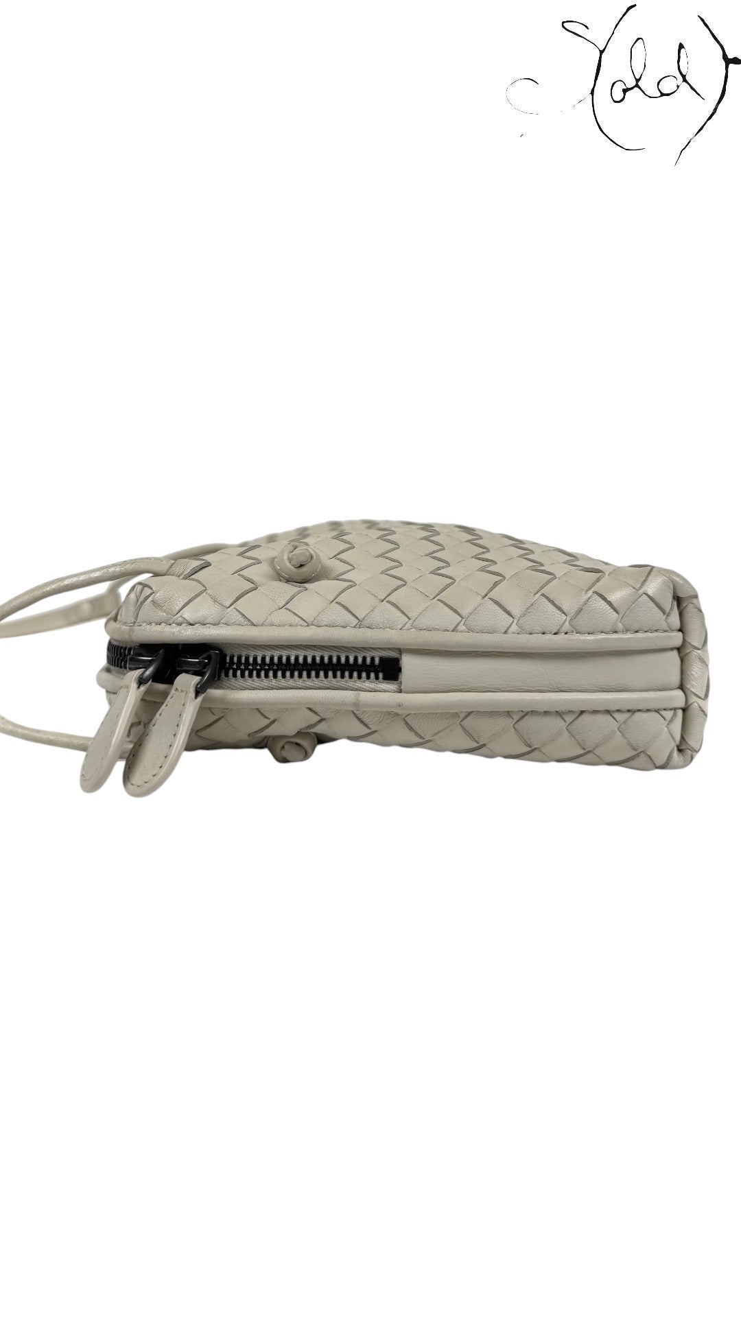 Sold Attire taupe nappa leather Bottega Veneta Nodini crossbody bag with signature Intrecciato weave and dark gunmetal zipper.