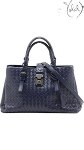 Sold Attire navy blue calfskin Bottega Veneta Roma small 2-way bag with signature Intrecciato weave and a central clasp.