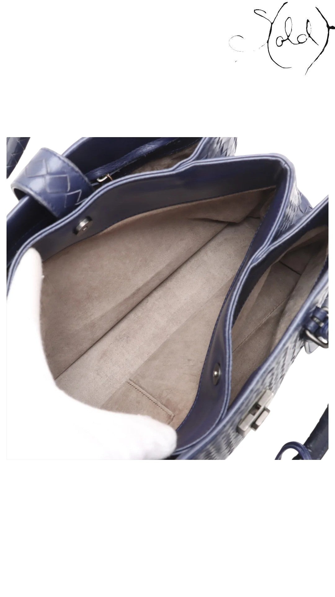 Sold Attire navy blue calfskin Bottega Veneta Roma small intrecciato 2-way bag interior with suede lining and gold-tone hardware.