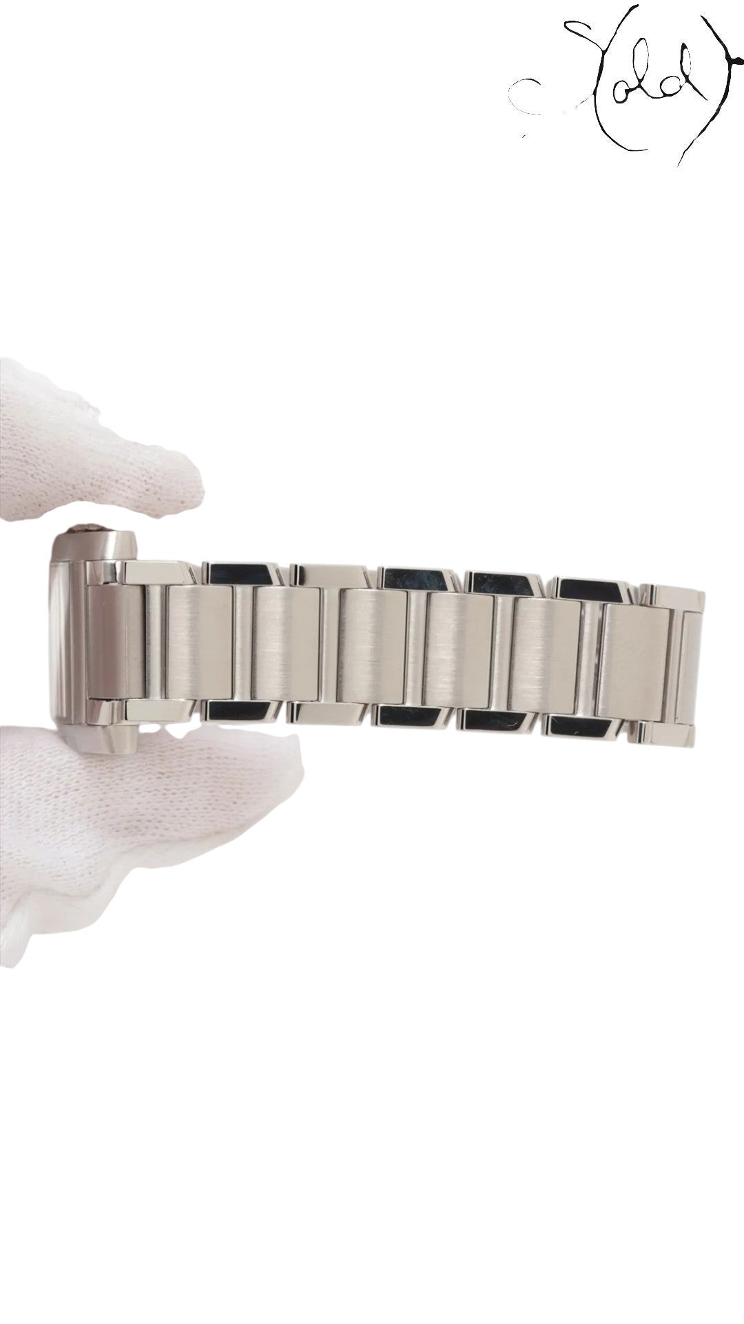 Sold Attire Cartier Tank Française small steel watch with pink mother of pearl dial and integrated bracelet.