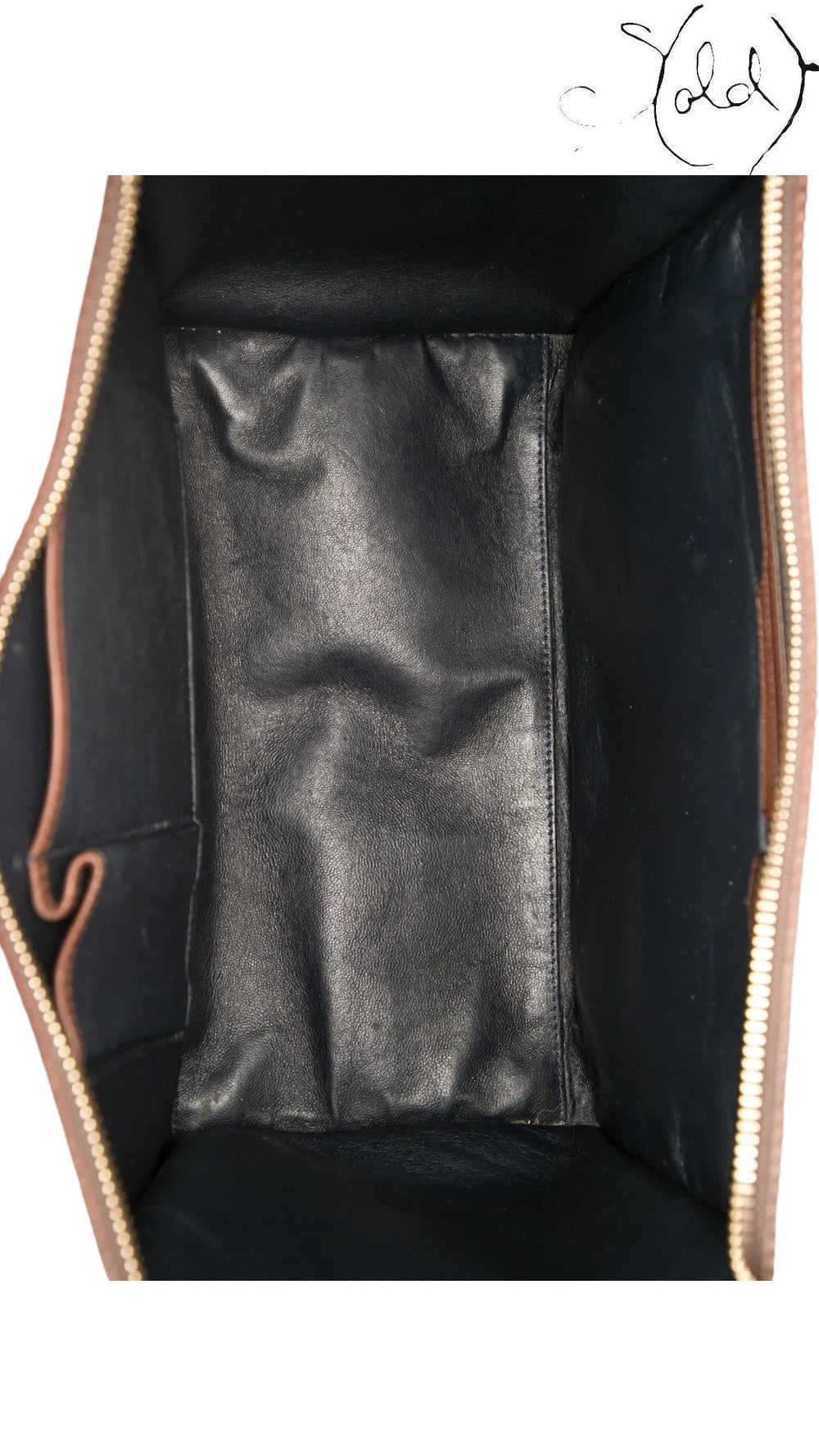 Interior view of a pre-owned Sold Attire Celine Luggage Mini Shopper featuring a spacious navy suede lining.