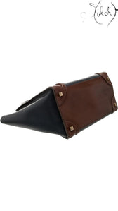 Sold Attire pre-owned Celine Luggage Mini Shopper in navy and brown leather with protective base studs