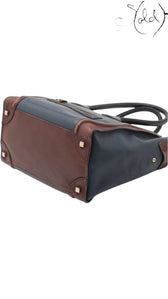 Sold Attire pre-owned Celine Luggage Mini Shopper in navy and brown leather with protective base studs