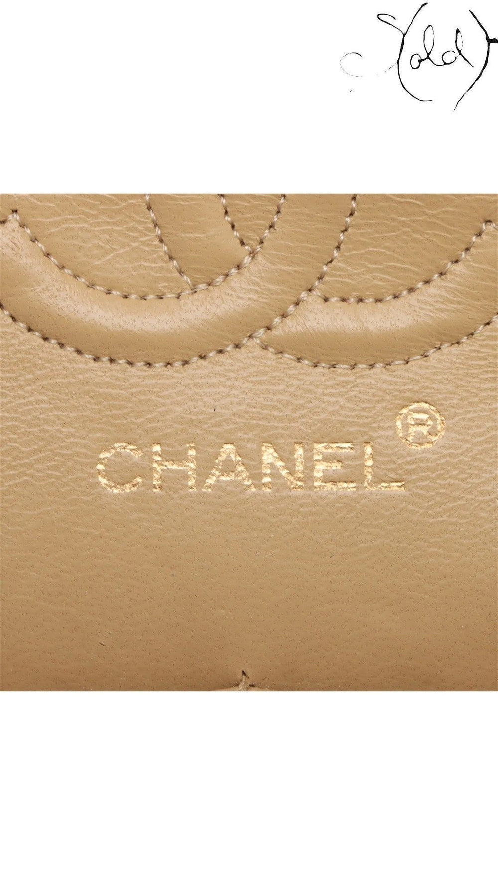 Sold Attire beige lambskin Chanel Matelasse 23 Double Flap bag detail showing quilted pattern and gold embossed logo.