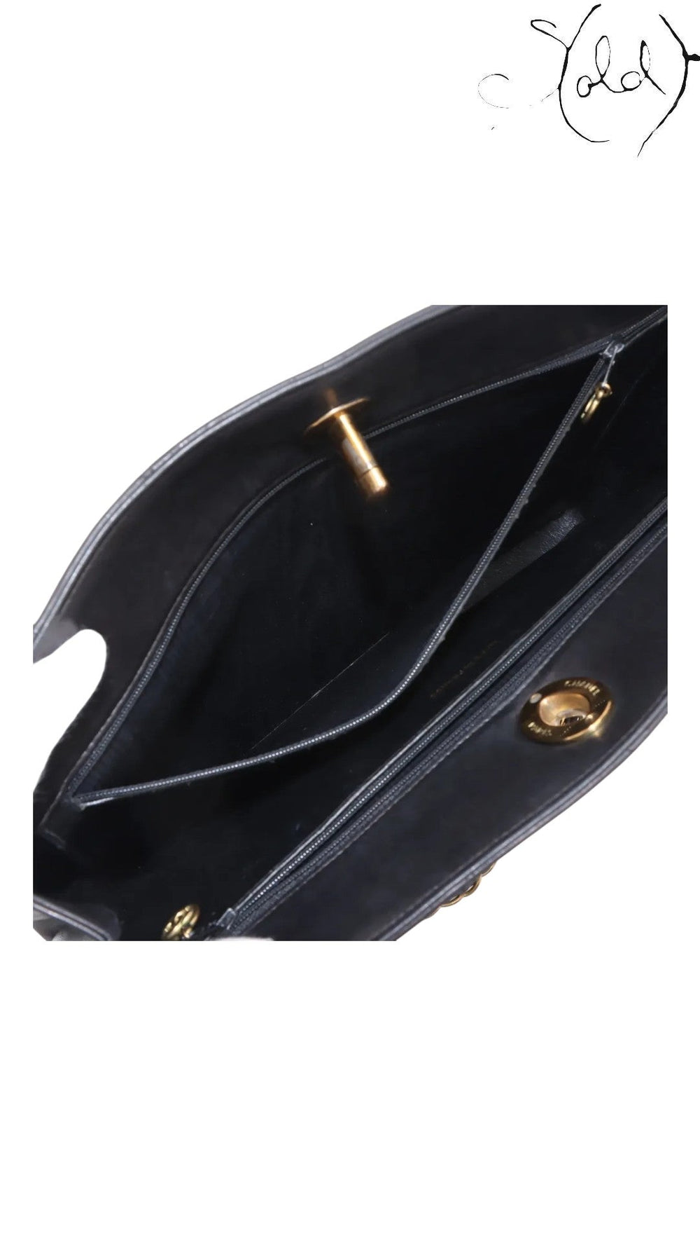 Sold Attire black quilted lambskin matelasse chain tote with gold hardware and interior pockets.