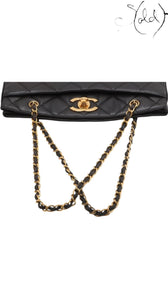 Sold Attire black quilted lambskin matelasse chain tote with gold-tone hardware and leather-woven chain straps.