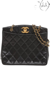 Sold Attire black quilted lambskin matelasse chain tote with gold hardware and CC logo.