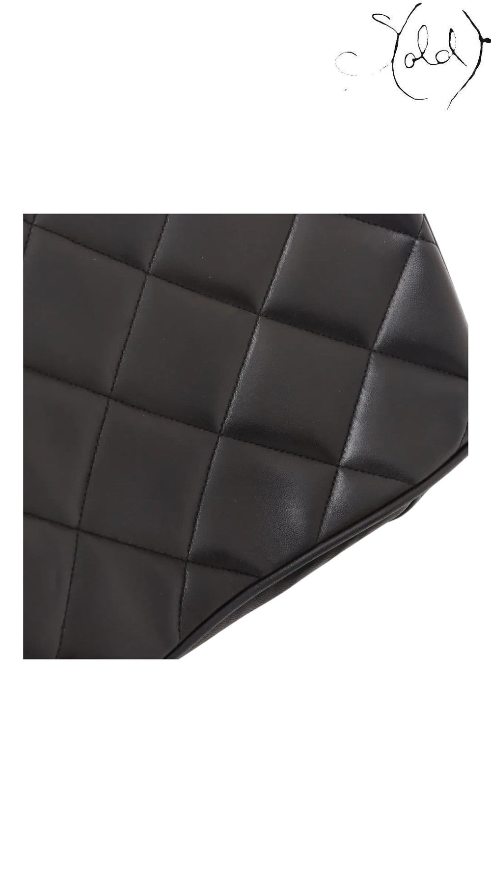 Sold Attire black quilted lambskin matelasse chain tote with gold-tone hardware.