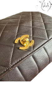 Sold Attire chocolate brown quilted lambskin Chanel Classique Single Full Flap bag with gold CC turn-lock closure.