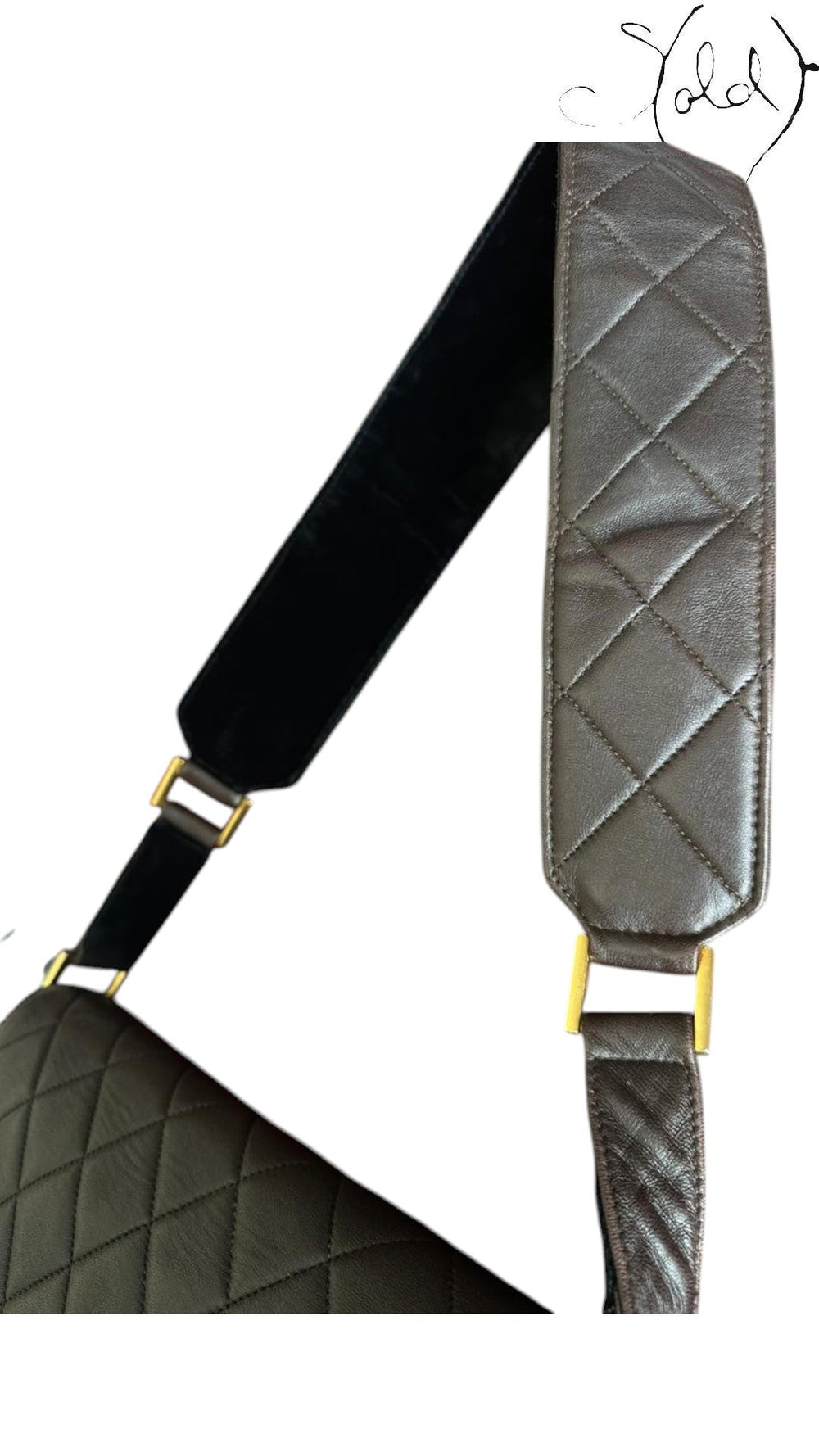 Sold Attire chocolate brown quilted lambskin Chanel Classique Single Full Flap bag with 24k gold hardware and suede strap.