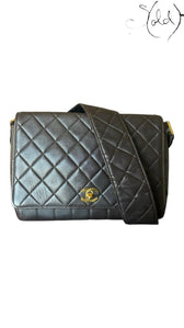 Sold Attire chocolate brown quilted lambskin Chanel Classique Single Full Flap bag with 24k gold CC turn-lock and strap.
