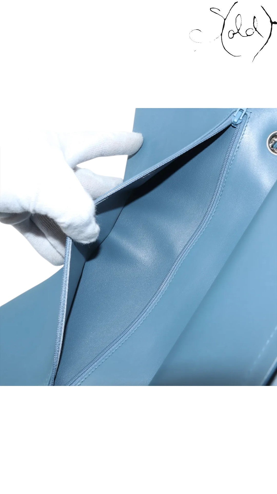 Sold Attire blue lambskin Chanel Deca Matelasse 30 double flap bag interior with zipper pocket.