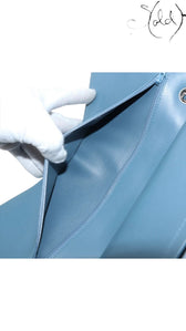 Sold Attire blue lambskin Chanel Deca Matelasse 30 double flap bag interior with zipper pocket.