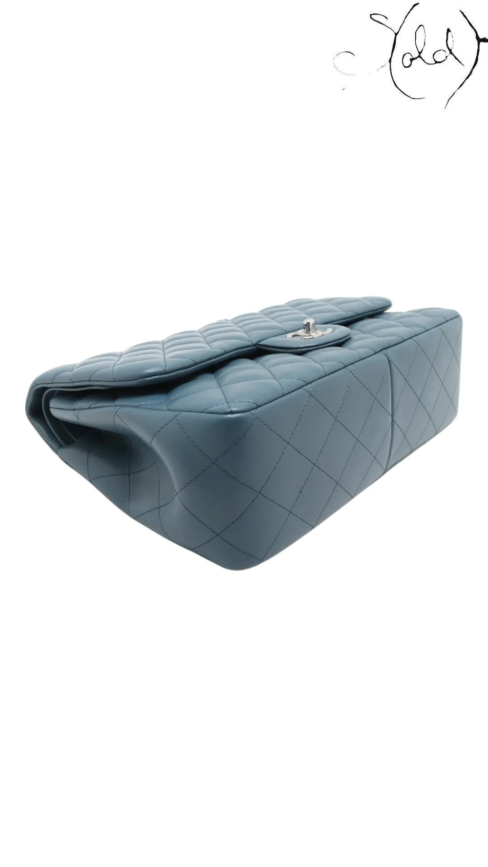 Sold Attire blue lambskin Chanel Deca Matelasse 30 Large Double Flap bag with silver-tone hardware and diamond quilting.