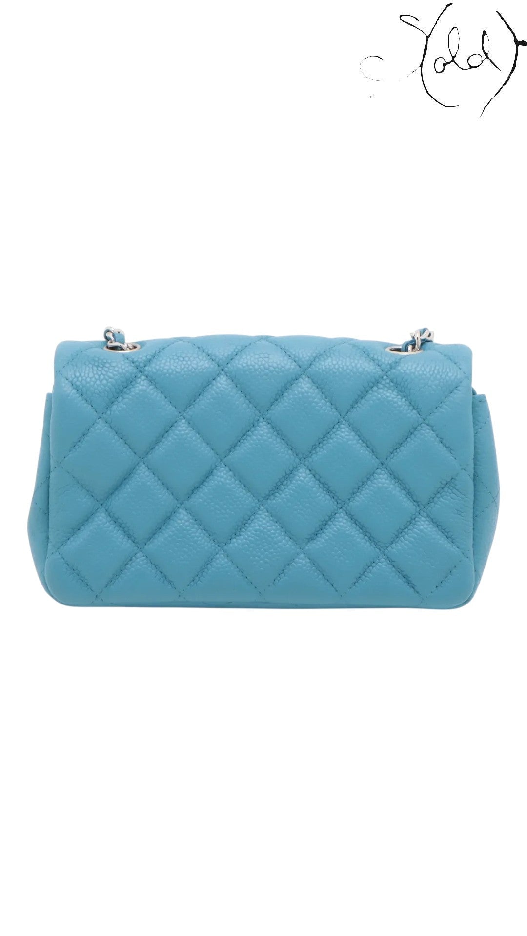 Sold Attire blue quilted caviar leather Chanel Extra Mini Classic Flap bag with silver-tone hardware and chain strap.