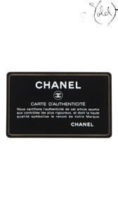 Sold Attire Chanel authenticity card with CC logo and French text