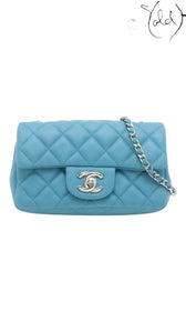 Sold Attire blue quilted caviar leather Chanel Extra Mini Classic Flap bag with silver-tone hardware and chain strap.