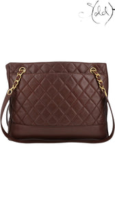 Sold Attire bordeaux lambskin Chanel Matelasse Chain Tote with diamond quilting and gold chain strap.