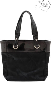 Sold Attire black Chanel Paris-Biarritz PM tote bag with quilted pony hair body and patent leather trim.