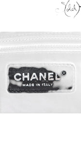Sold Attire black Chanel Paris-Biarritz PM tote bag interior label with silver Chanel logo and Made in Italy text.