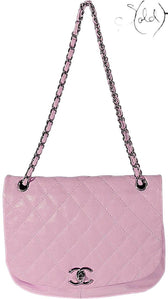 Sold Attire pastel purple lambskin Chanel Trianon messenger bag with diamond quilting and brushed gold-tone CC turn-lock closure.